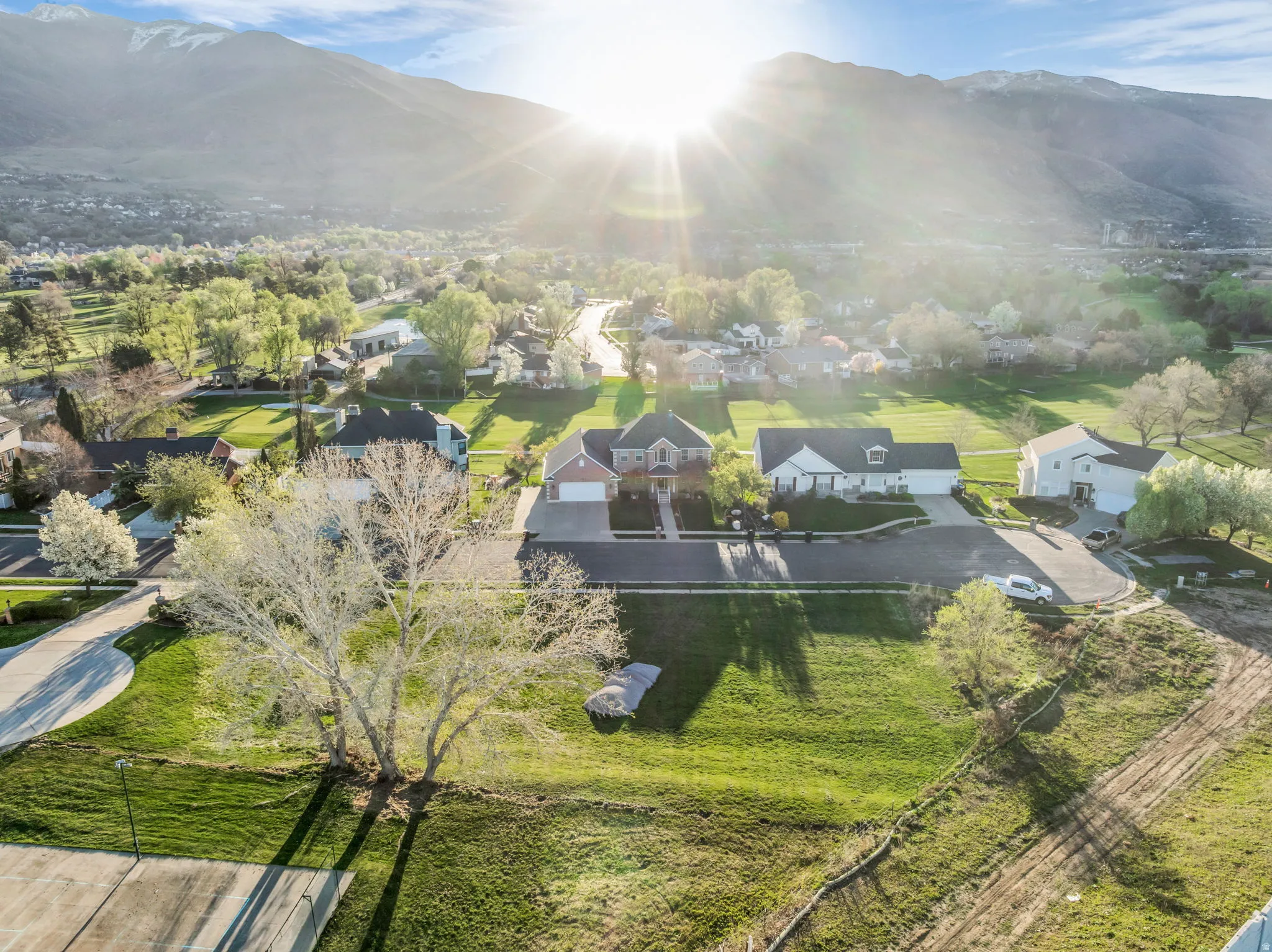 Aerial perspective of suburban area with mountains