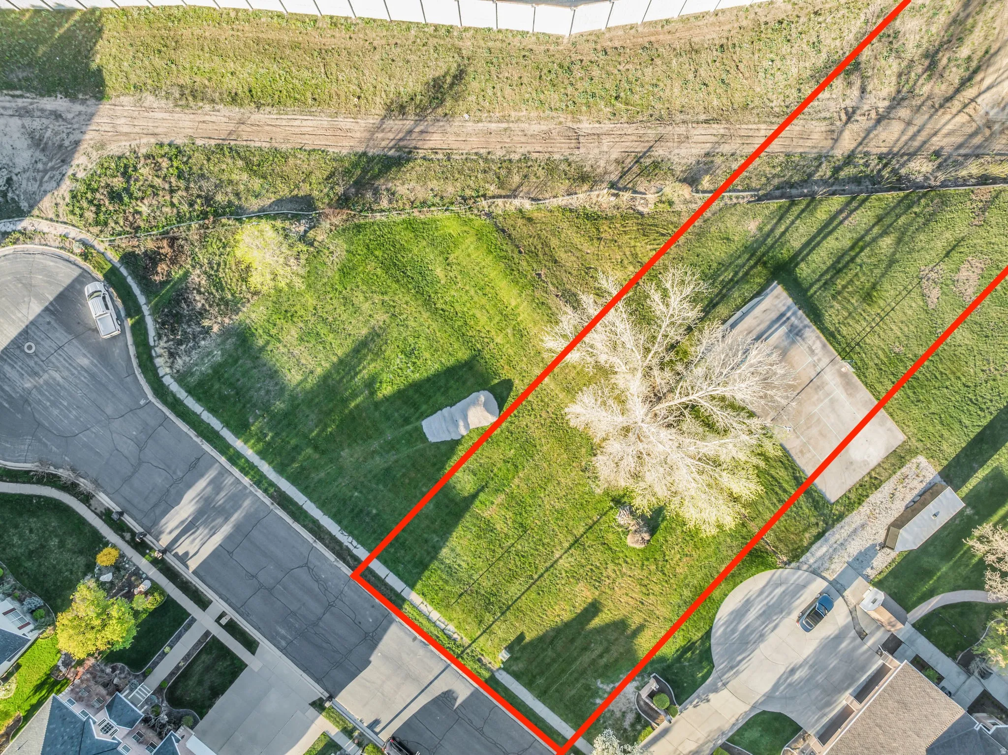 Aerial overview of property's location featuring property parcel outlined