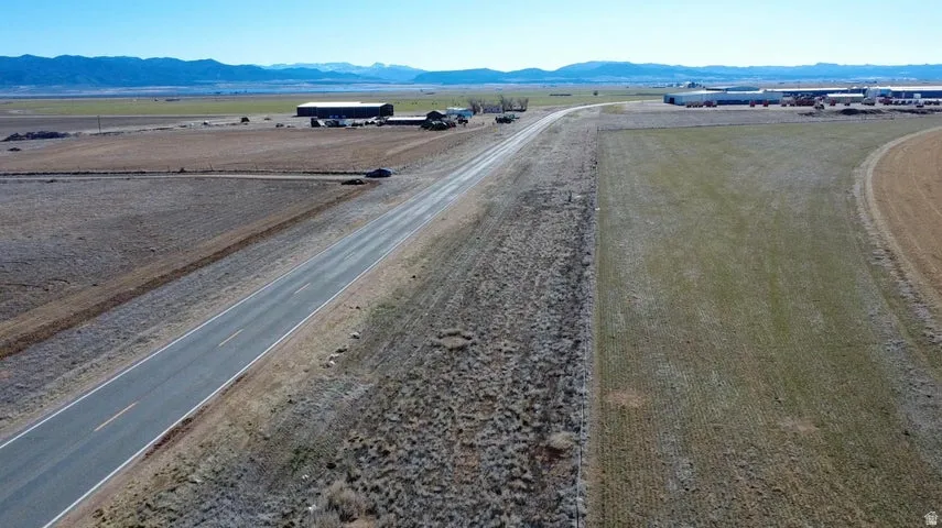 View of road with a mountain view and a view of countryside
