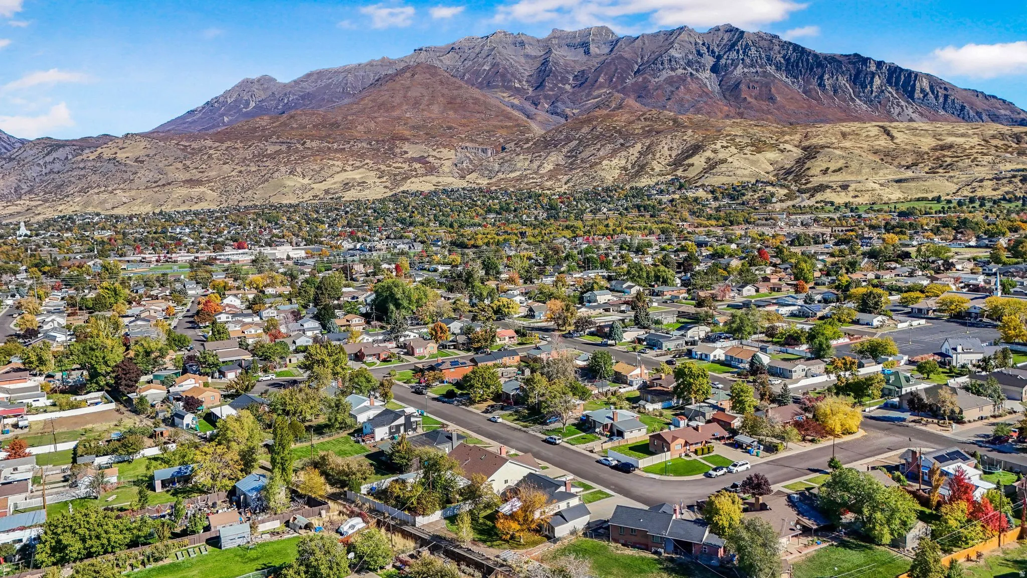 Aerial view of residential area with mountains