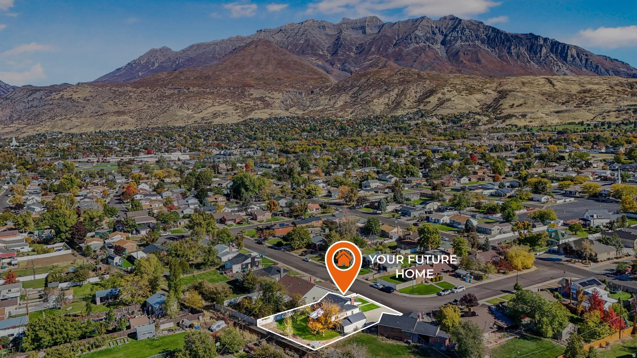 Aerial perspective of suburban area with mountains