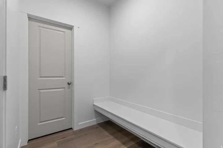 Mudroom featuring light wood finished floors