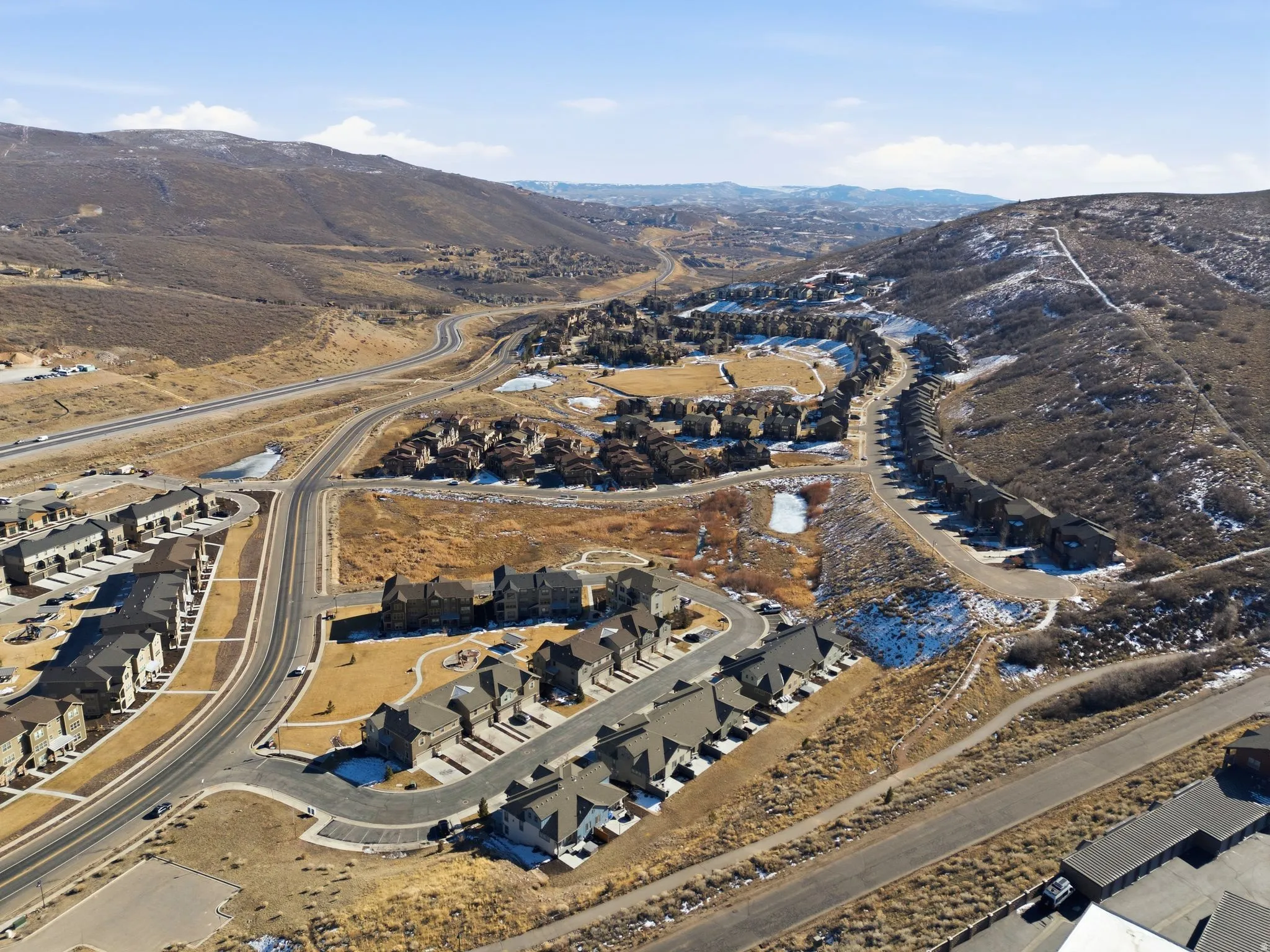 Drone / aerial view of a mountain backdrop