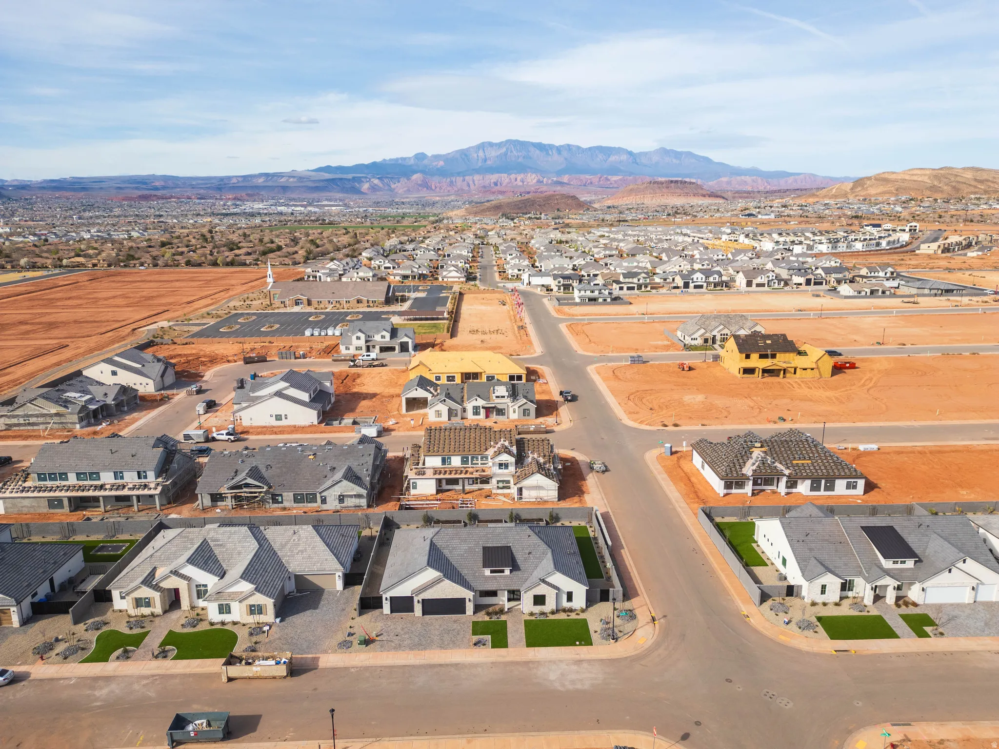 Aerial view of residential area with a mountain backdrop