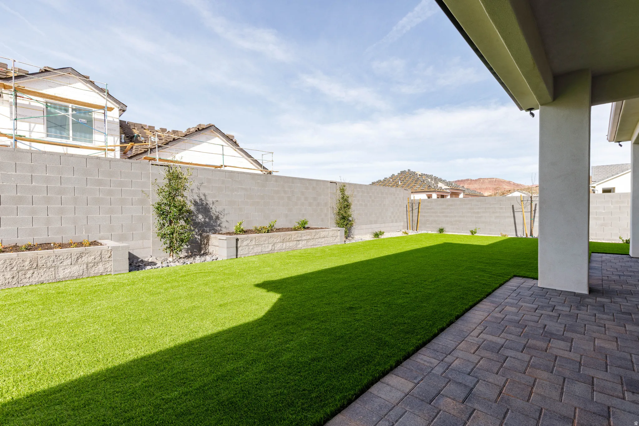 Fenced backyard featuring a patio area