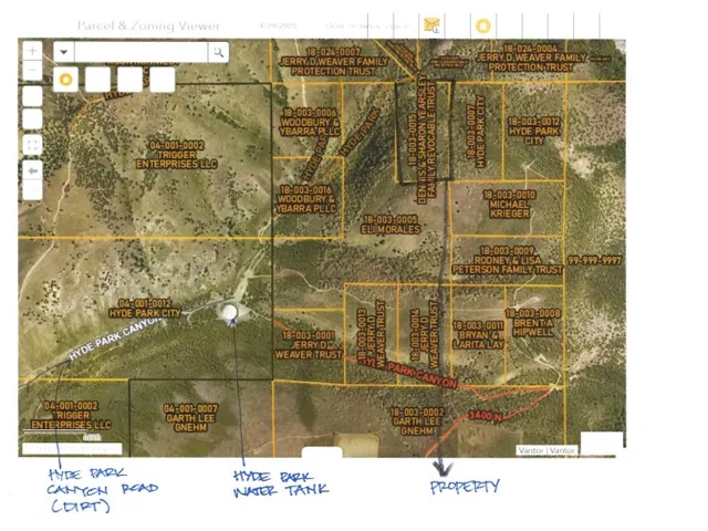 Aerial map of property and surrounding area featuring property parcel outlined
