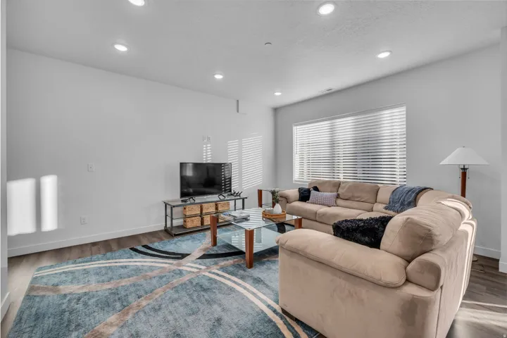 Open concept living area is room and comfortable with lots of natural light