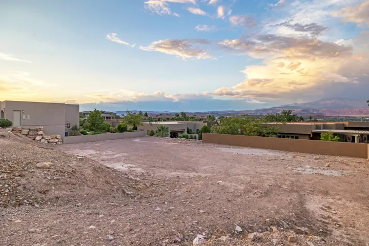Yard at dusk with a mountain view