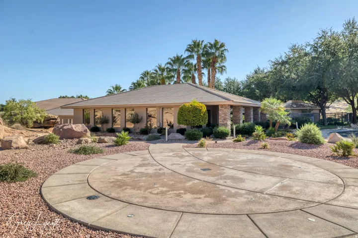 View of front of home with a tile roof