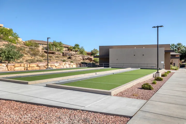 View of property's community with a bocce ball area