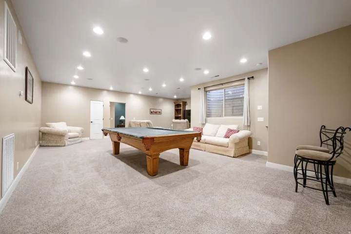 Playroom featuring pool table, recessed lighting, and light carpet