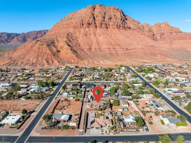 Aerial view of residential area with a mountainous background