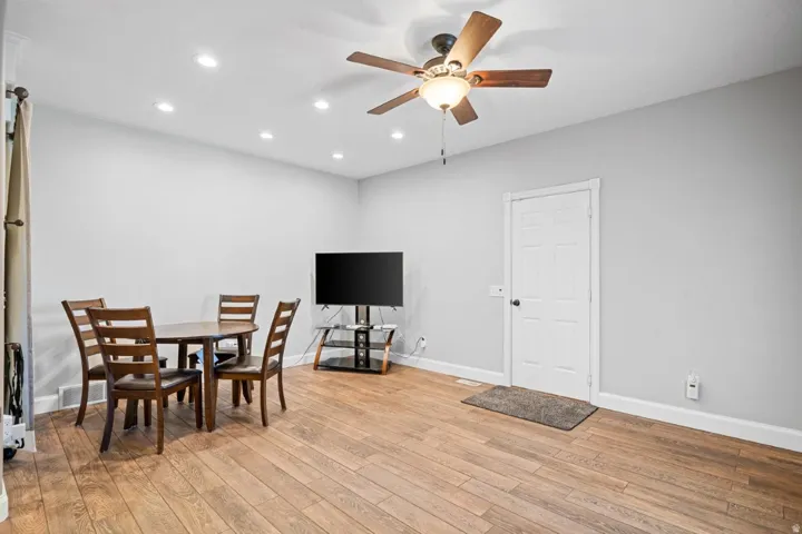 Dining area featuring recessed lighting, a ceiling fan, and light wood-type flooring