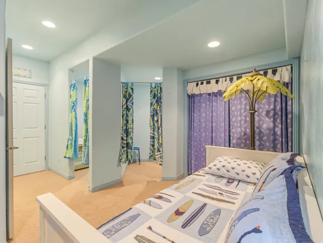 Bedroom featuring recessed lighting and light colored carpet