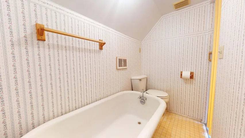 Bathroom has a lovely clawfoot tub.