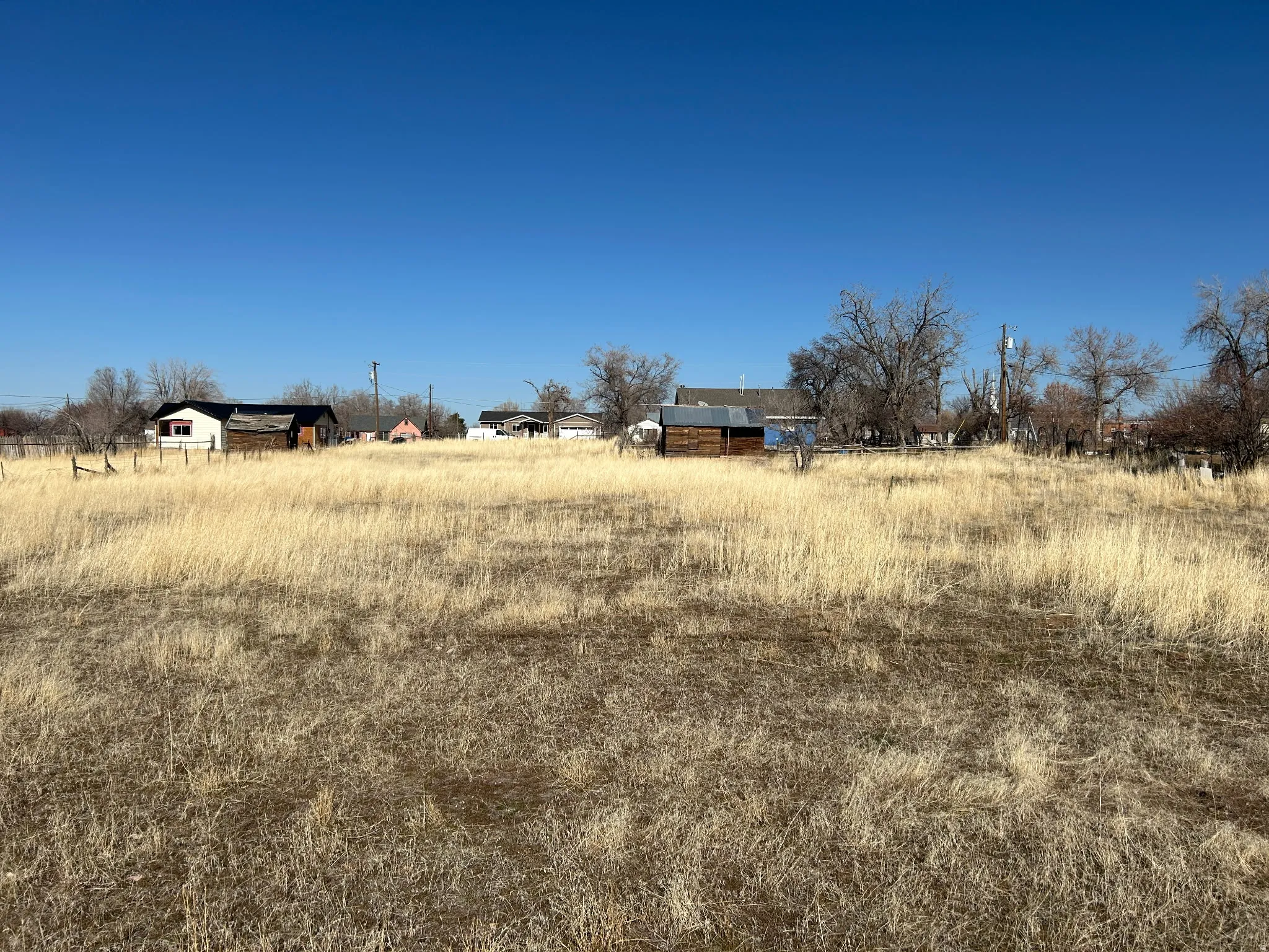 View of yard with a rural view
