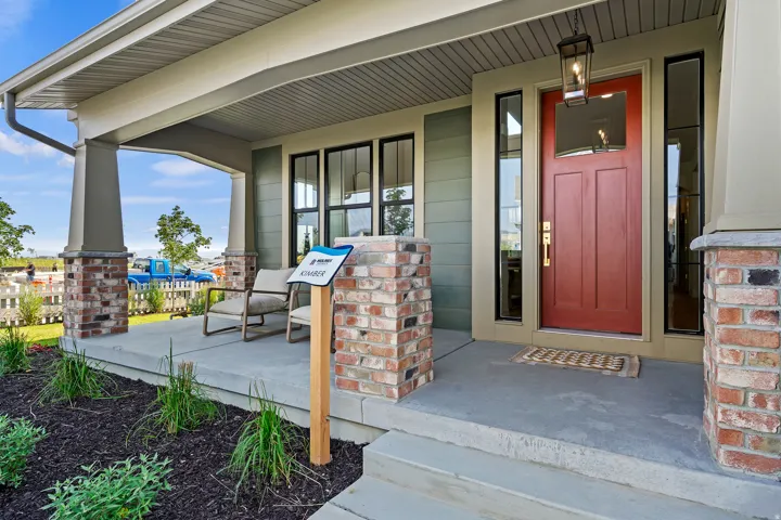 Property entrance with covered porch