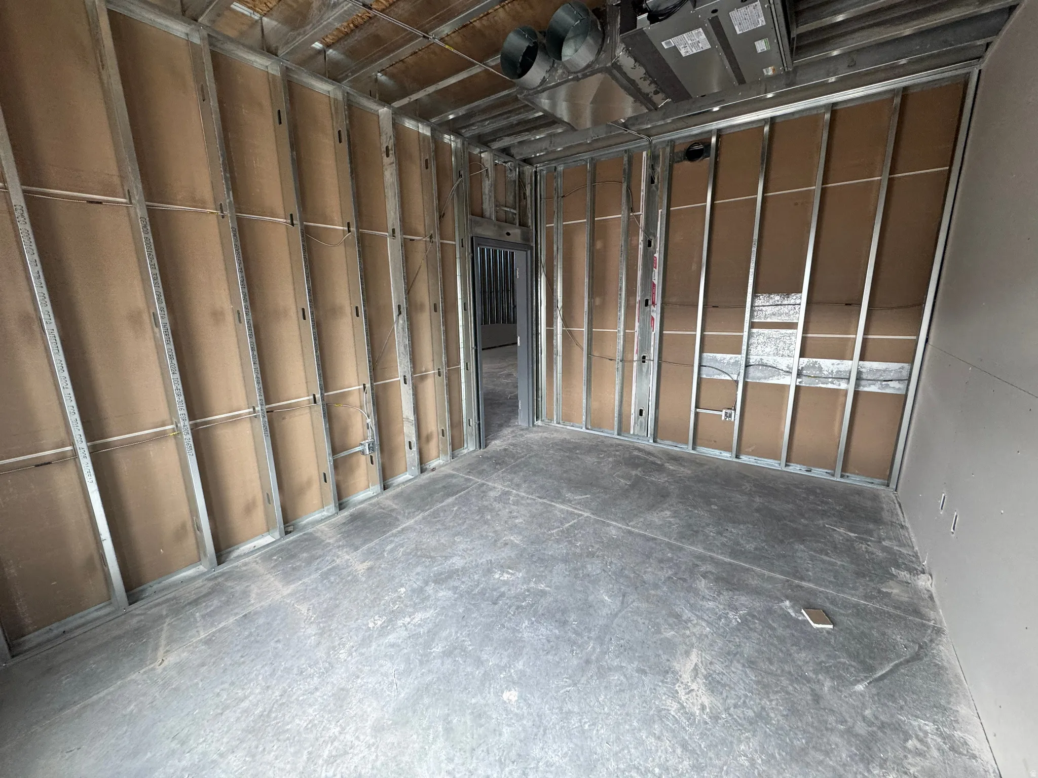 Misc room with a garage