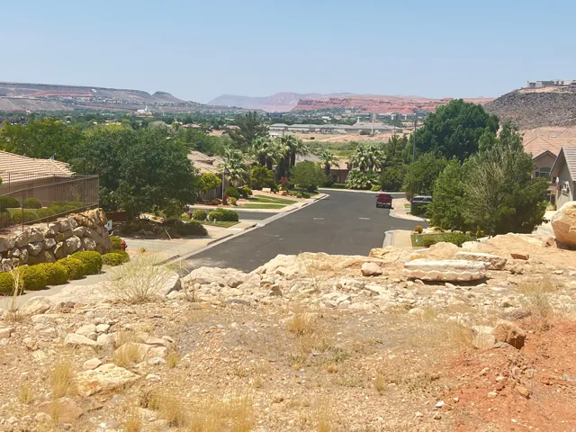 View of asphalt street with a mountain view and a residential view