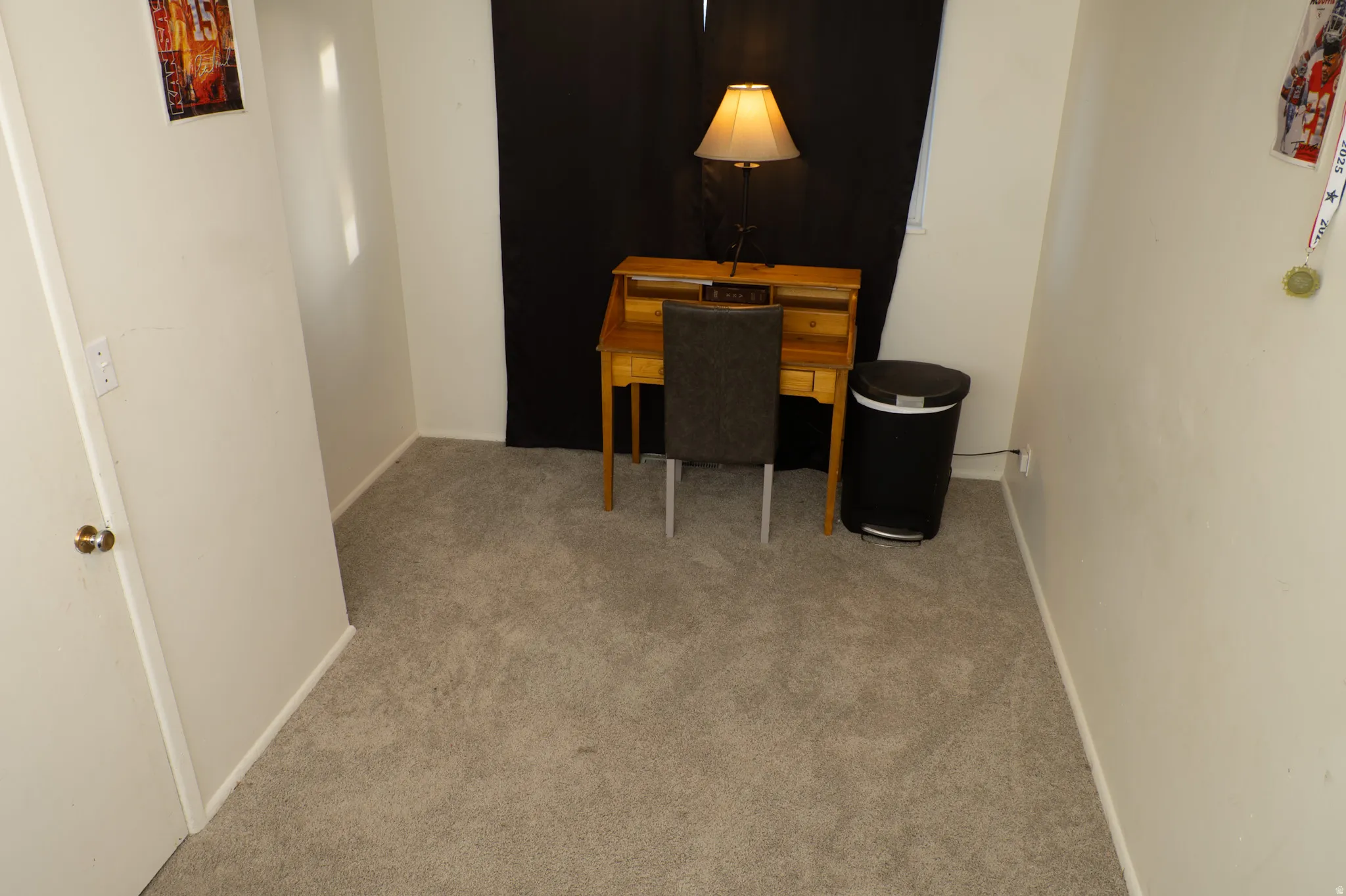 Office area with carpet floors and baseboards