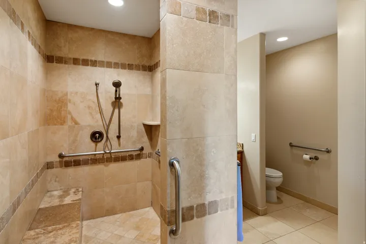 Full bathroom featuring a walk in shower, recessed lighting, and tile patterned flooring