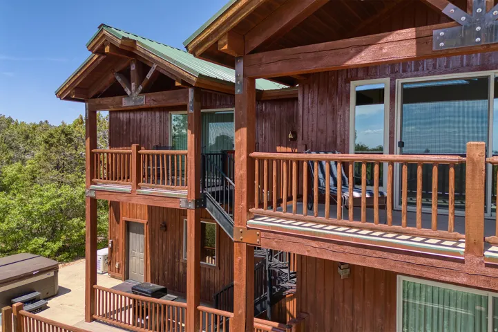 Wooden deck with a hot tub