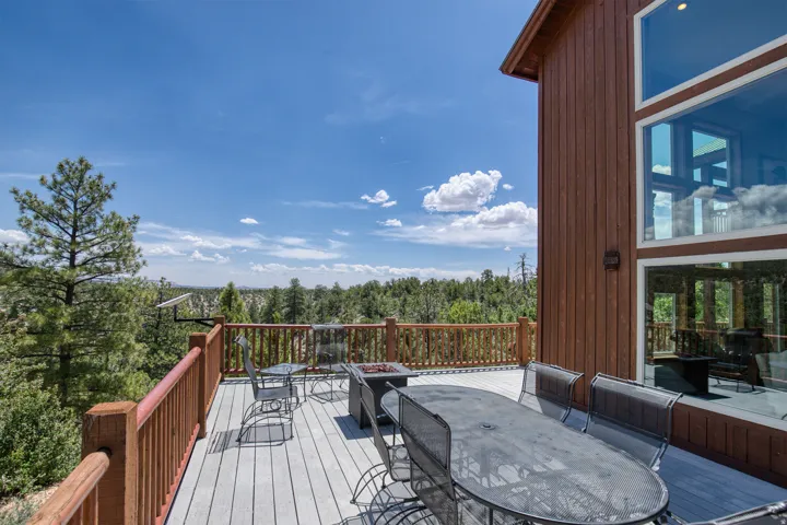 Wooden terrace with outdoor dining area