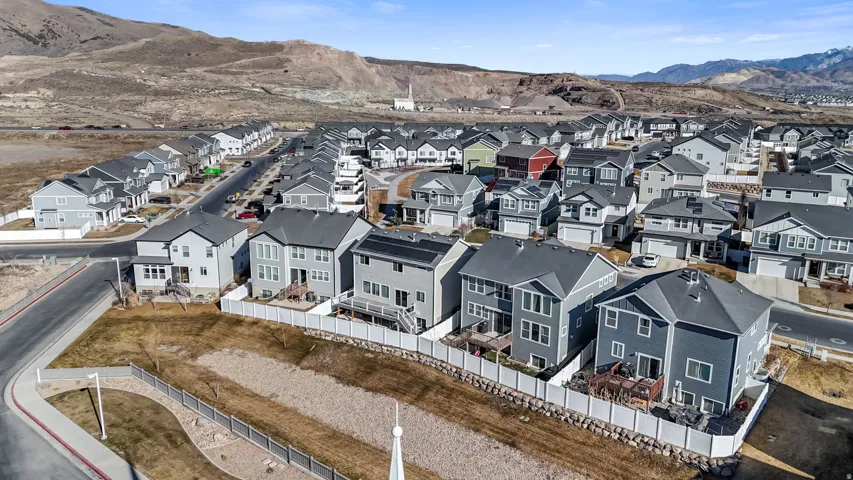 Aerial perspective of suburban area featuring mountains