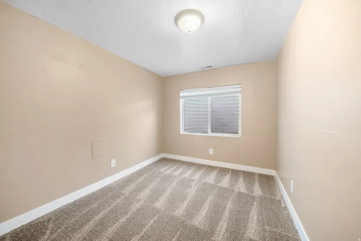 secondary room that could be used as guest room, office or gym