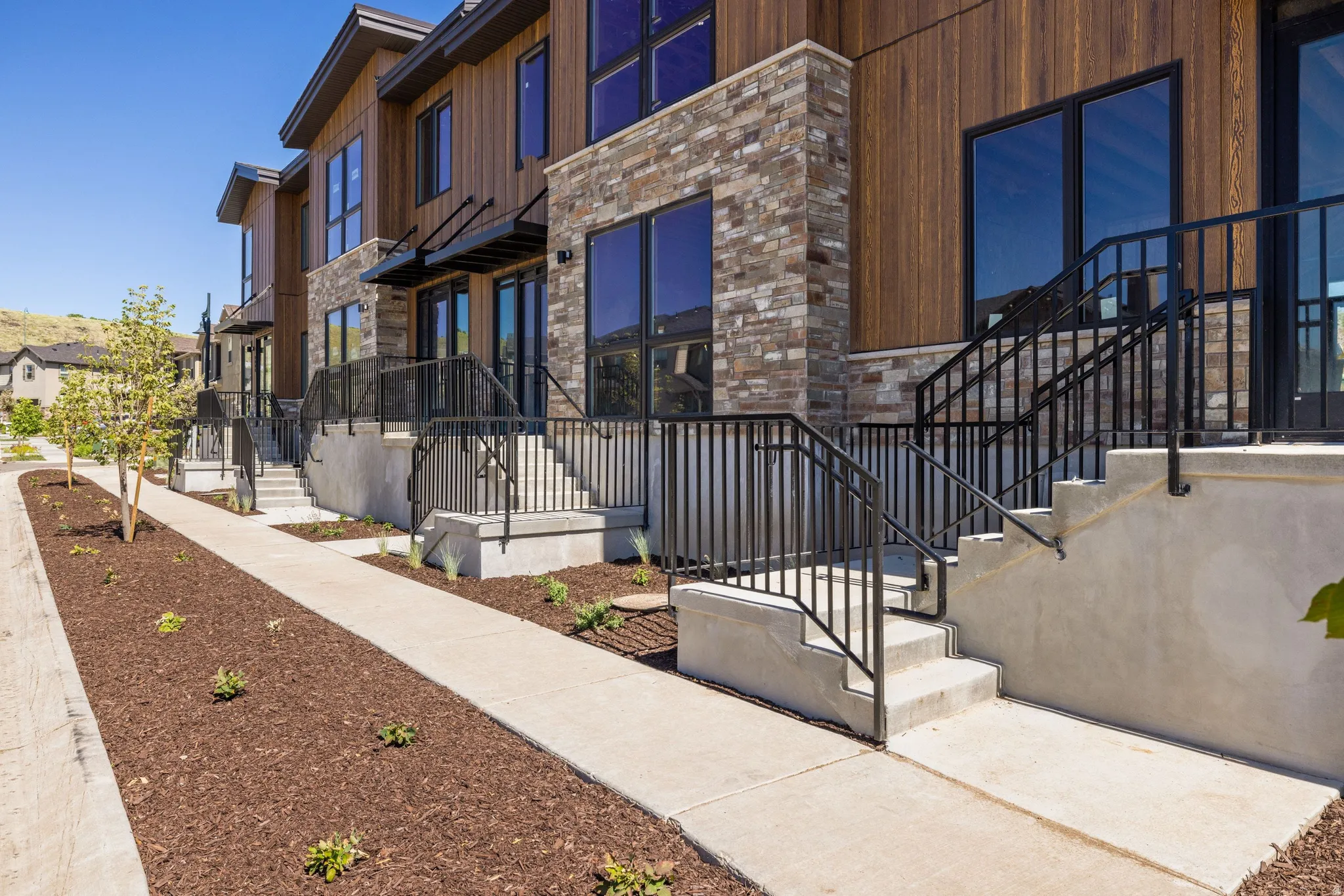 View of property featuring stairway