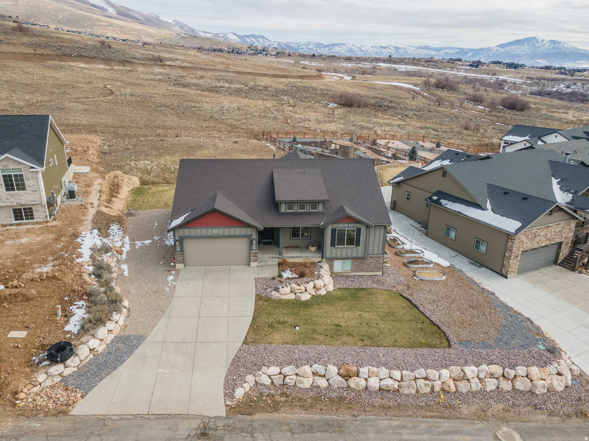 Aerial view of residential area with a mountain backdrop