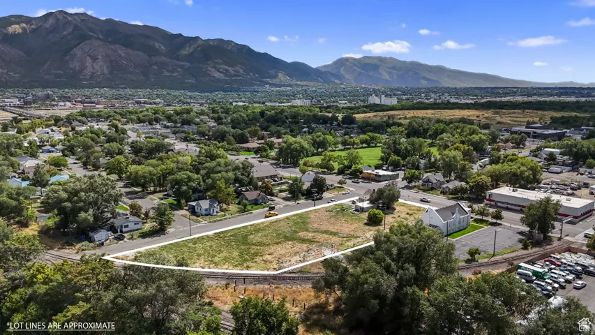 Aerial overview of property's location featuring mountains and property boundaries highlighted