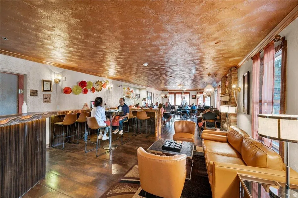 Community lobby with ornamental molding and wainscoting