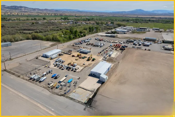 Aerial view of an industrial area and mountains