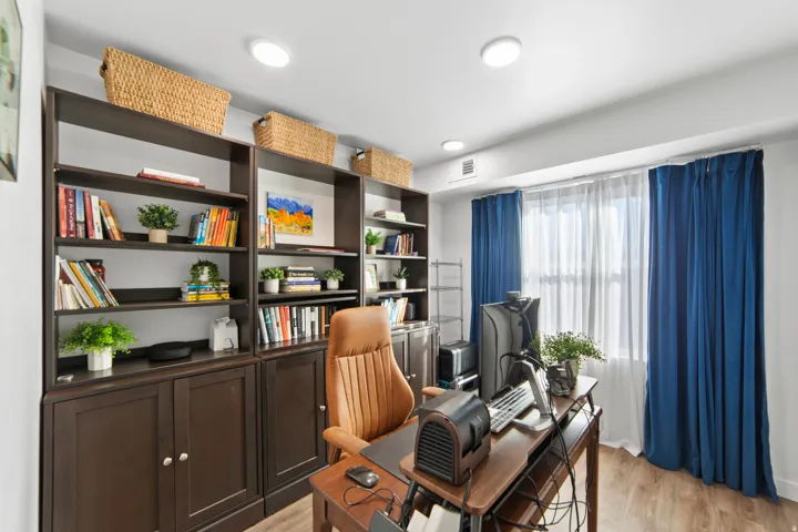 Office with light wood finished floors