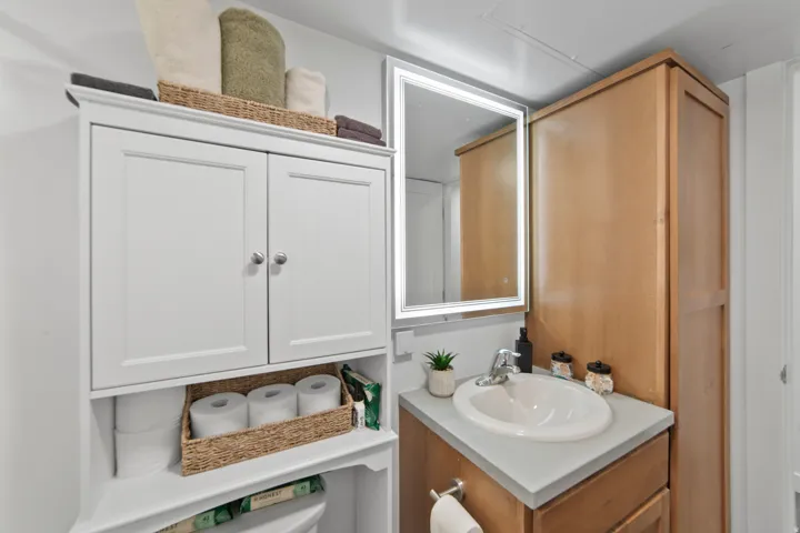 Half bathroom featuring vanity