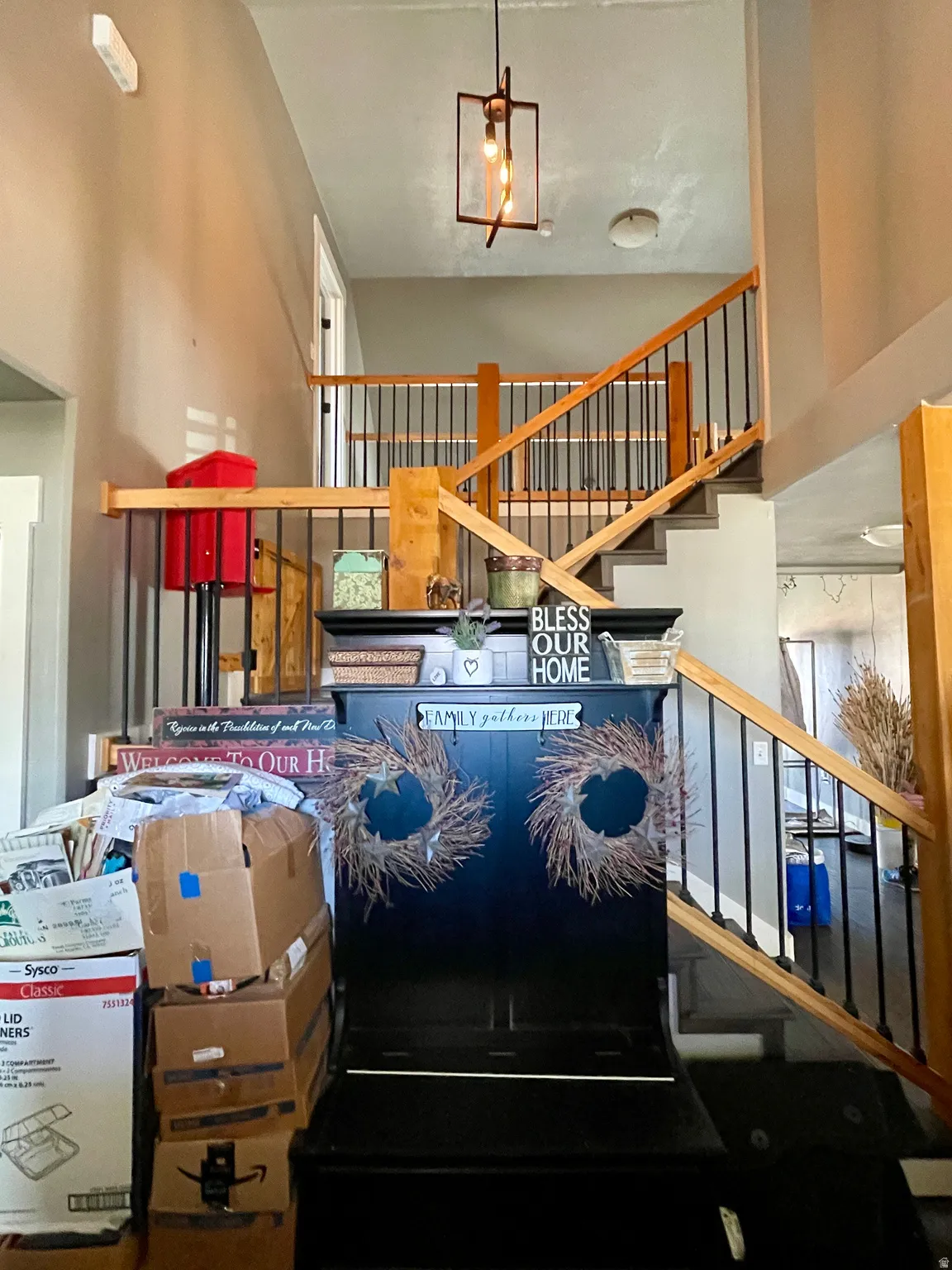 Stairway featuring a high ceiling