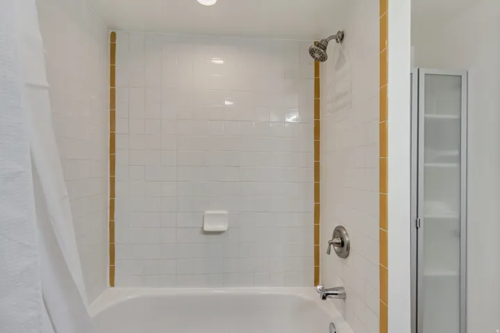 Apt. #5 Bathroom with shower / tub combo