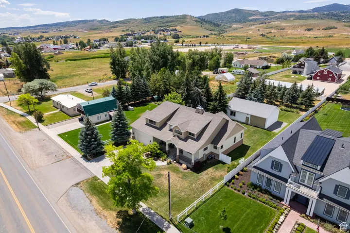 Aerial view of residential area featuring mountains