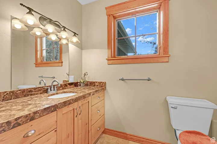 Bathroom with toilet and vanity