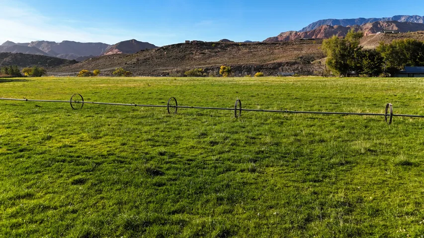 Mountain view featuring a pastoral area and rural landscape