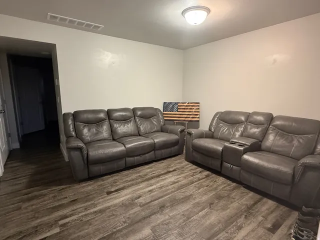 Living room featuring dark wood finished floors