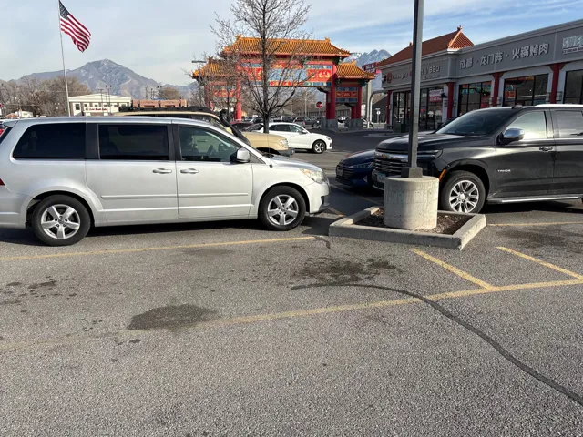 Uncovered parking lot with a mountain view