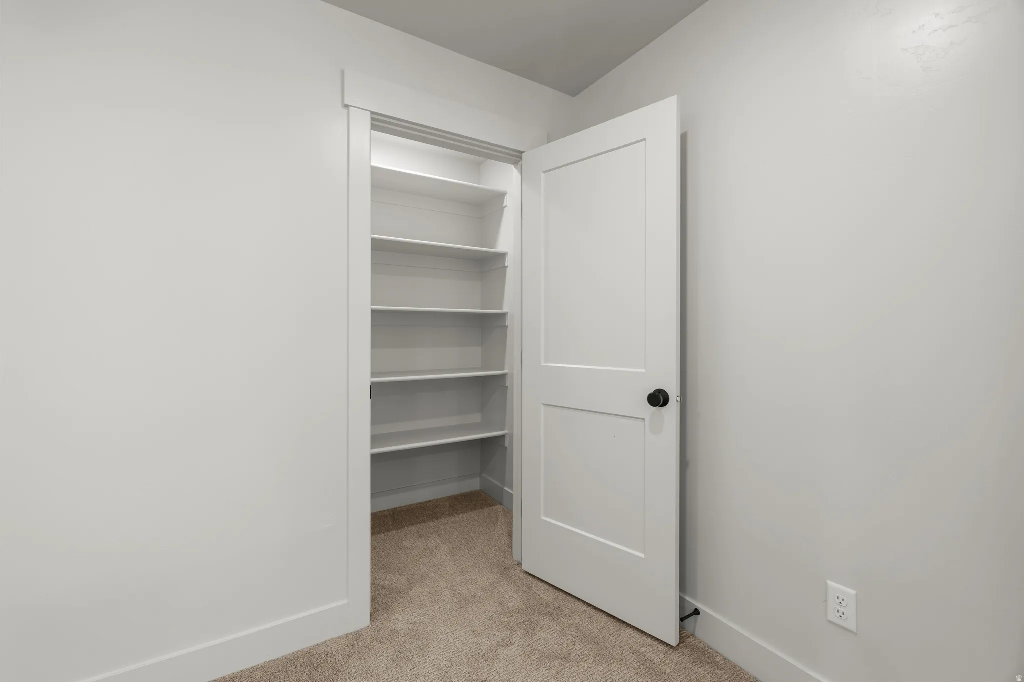 Closet in primary bedroom