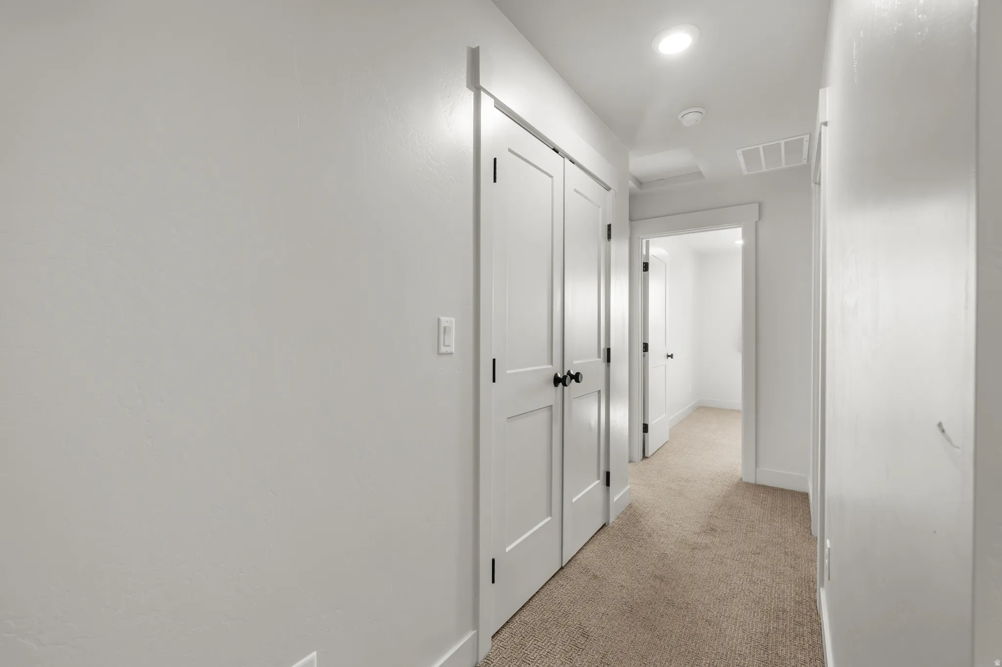 Hall with doors for laundry area