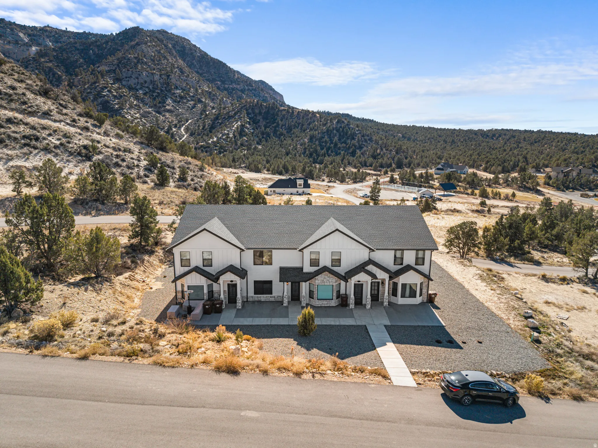 View of front facade featuring a mountain view and a porch