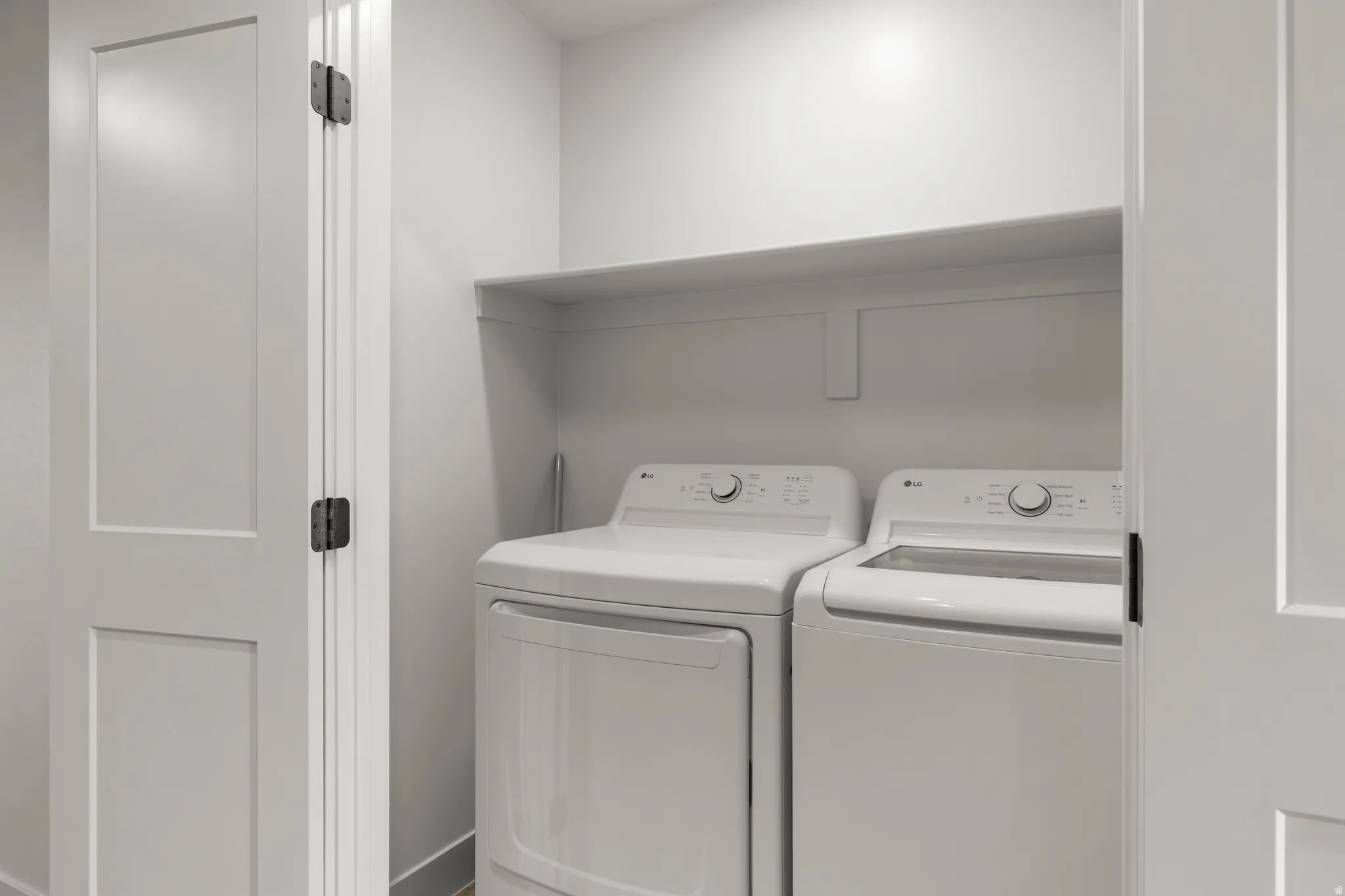 Laundry area with washing machine and dryer