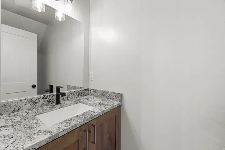 Half bathroom off kitchen