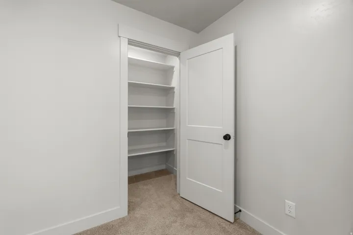 Closet in primary bedroom