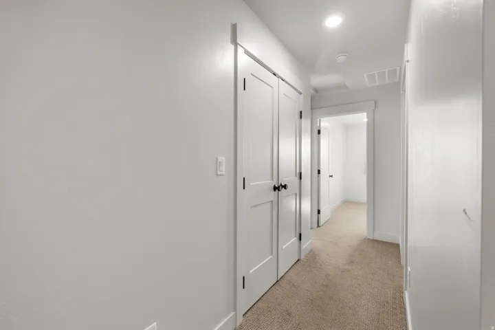 Hall with doors for laundry area